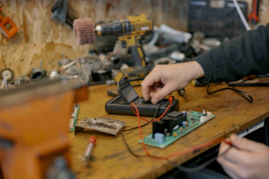 close up of electrician hands checks the electrica 2022 08 25 15 16 43 utc